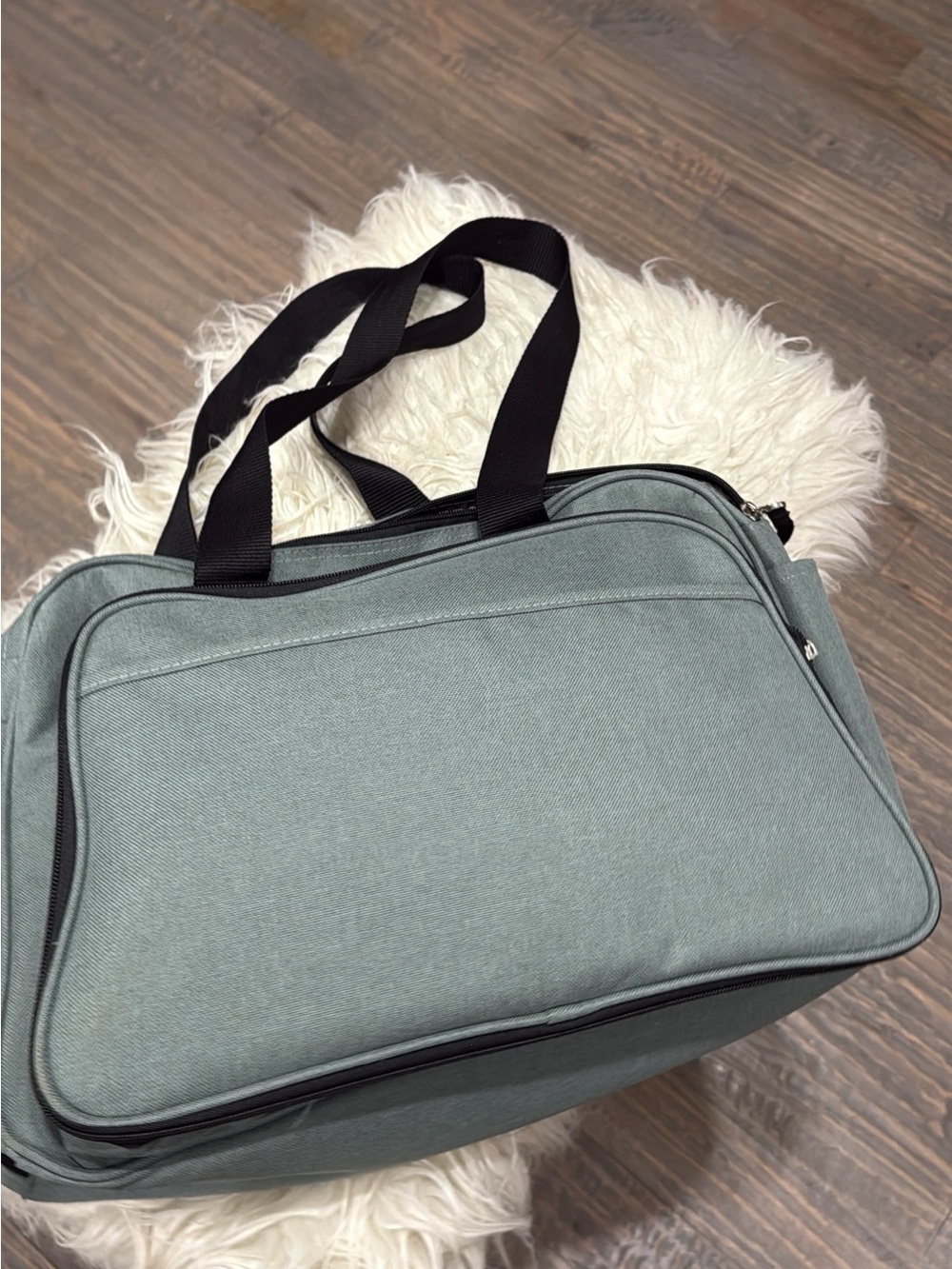 Diaper duffel bag with sleeping section for baby